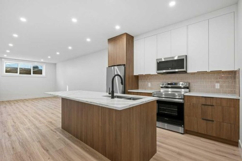 3519 42 Street Sw, Calgary, AB - Indoor Photo Showing Kitchen With Upgraded Kitchen