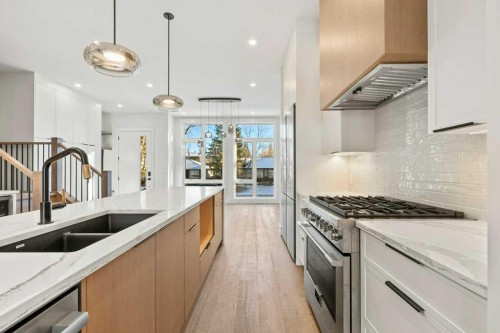 3519 42 Street Sw, Calgary, AB - Indoor Photo Showing Kitchen With Double Sink With Upgraded Kitchen