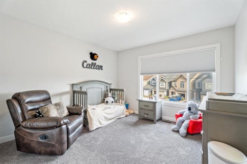 39 Cranbrook Green Se, Calgary, AB - Indoor Photo Showing Bedroom