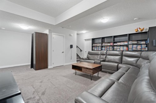 39 Cranbrook Green Se, Calgary, AB - Indoor Photo Showing Living Room
