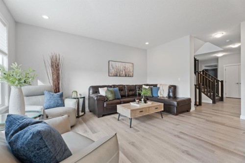 39 Cranbrook Green Se, Calgary, AB - Indoor Photo Showing Living Room