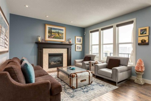 308 Rainbow Falls Way, Chestermere, AB - Indoor Photo Showing Living Room With Fireplace