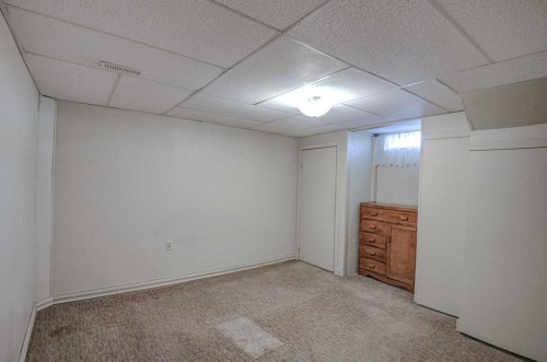 3420 Lane Crescent Sw, Calgary, AB - Indoor Photo Showing Basement