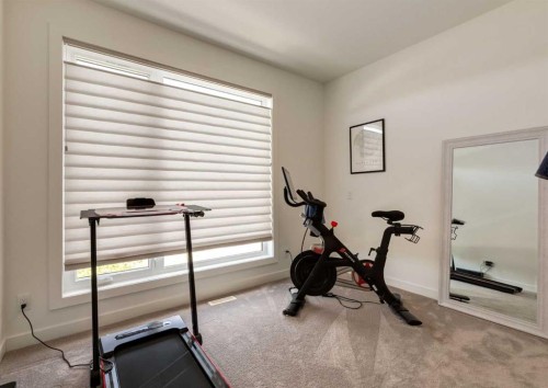 4905 16 Street Sw, Calgary, AB - Indoor Photo Showing Gym Room