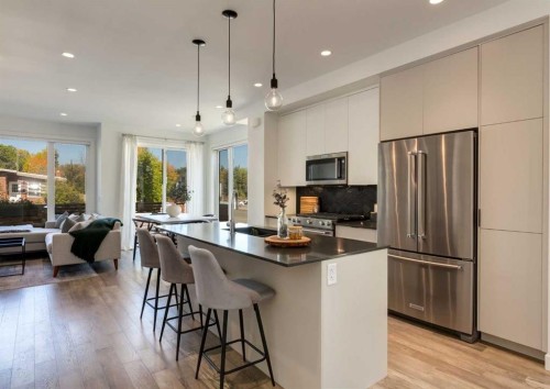 4905 16 Street Sw, Calgary, AB - Indoor Photo Showing Kitchen With Stainless Steel Kitchen With Upgraded Kitchen