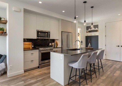 4905 16 Street Sw, Calgary, AB - Indoor Photo Showing Kitchen With Stainless Steel Kitchen With Upgraded Kitchen