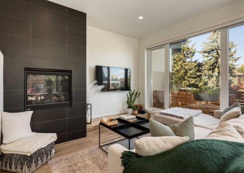 4905 16 Street Sw, Calgary, AB - Indoor Photo Showing Living Room With Fireplace