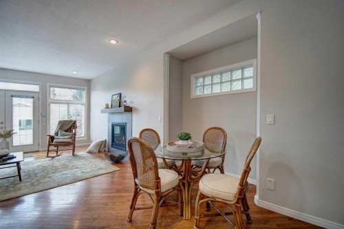 923 5 Street Nw, Calgary, AB - Indoor Photo Showing Other Room With Fireplace