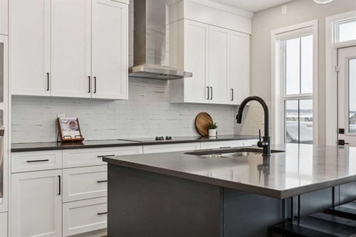 103 Saddlebred Link, Cochrane, AB - Indoor Photo Showing Kitchen With Upgraded Kitchen