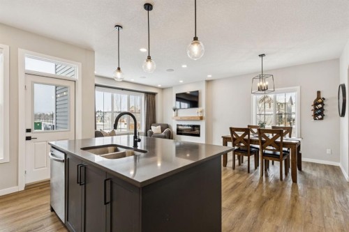 103 Saddlebred Link, Cochrane, AB - Indoor Photo Showing Kitchen With Double Sink With Upgraded Kitchen