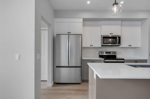 1277 Creekview Drive Sw, Calgary, AB - Indoor Photo Showing Kitchen With Double Sink With Upgraded Kitchen