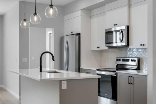 1277 Creekview Drive Sw, Calgary, AB - Indoor Photo Showing Kitchen With Upgraded Kitchen