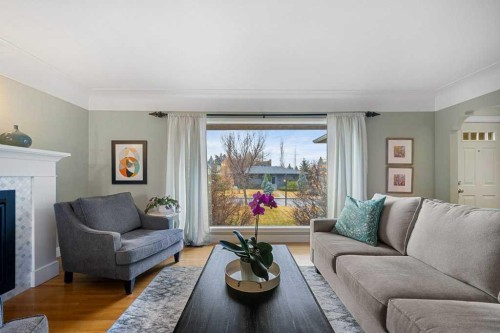 3204 24A Street Sw, Calgary, AB - Indoor Photo Showing Living Room With Fireplace