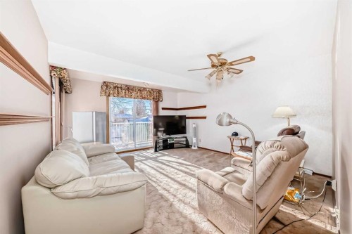 2119 Mackid Crescent Ne, Calgary, AB - Indoor Photo Showing Living Room