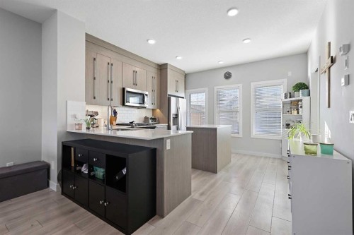 1249 Carrington Boulevard Nw, Calgary, AB - Indoor Photo Showing Kitchen With Upgraded Kitchen