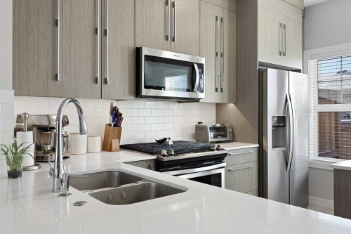 1249 Carrington Boulevard Nw, Calgary, AB - Indoor Photo Showing Kitchen With Stainless Steel Kitchen With Double Sink With Upgraded Kitchen