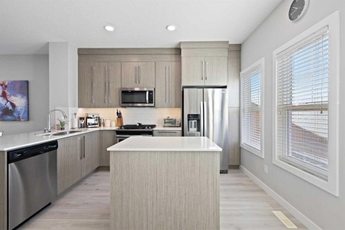 1249 Carrington Boulevard Nw, Calgary, AB - Indoor Photo Showing Kitchen With Stainless Steel Kitchen With Upgraded Kitchen