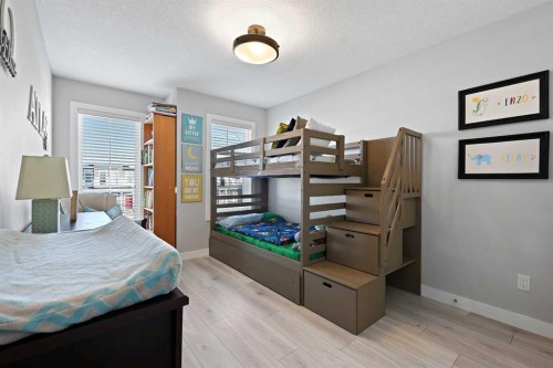 1249 Carrington Boulevard Nw, Calgary, AB - Indoor Photo Showing Bedroom
