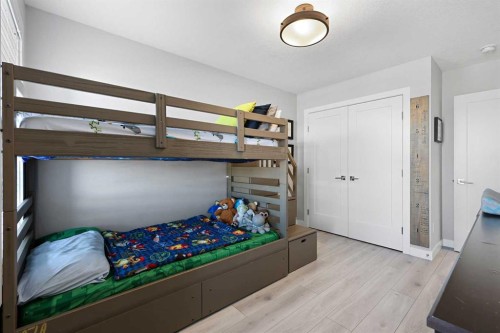 1249 Carrington Boulevard Nw, Calgary, AB - Indoor Photo Showing Bedroom