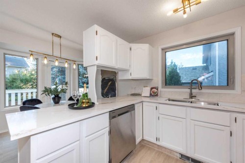 47 Hawkstone Drive Nw, Calgary, AB - Indoor Photo Showing Kitchen With Double Sink