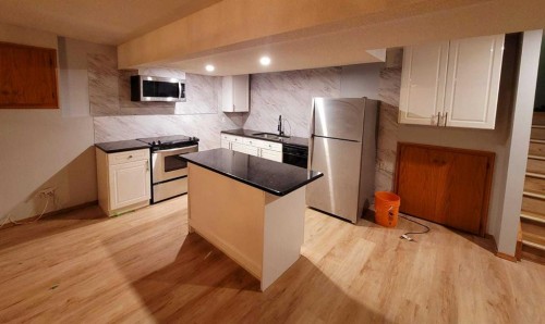 47 Hawkstone Drive Nw, Calgary, AB - Indoor Photo Showing Kitchen With Stainless Steel Kitchen