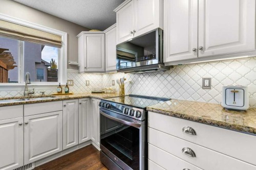 178 Cranwell Close Se, Calgary, AB - Indoor Photo Showing Kitchen With Upgraded Kitchen