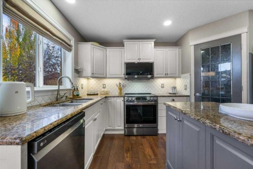 178 Cranwell Close Se, Calgary, AB - Indoor Photo Showing Kitchen With Double Sink With Upgraded Kitchen