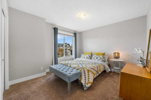 178 Cranwell Close Se, Calgary, AB - Indoor Photo Showing Bedroom