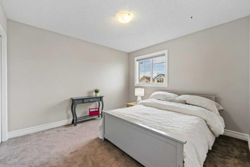 178 Cranwell Close Se, Calgary, AB - Indoor Photo Showing Bedroom