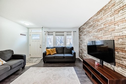 172 Auburn Meadows Walk Se, Calgary, AB - Indoor Photo Showing Living Room With Fireplace