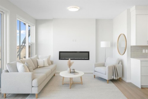 136 Lucas Gardens Nw, Calgary, AB - Indoor Photo Showing Living Room With Fireplace