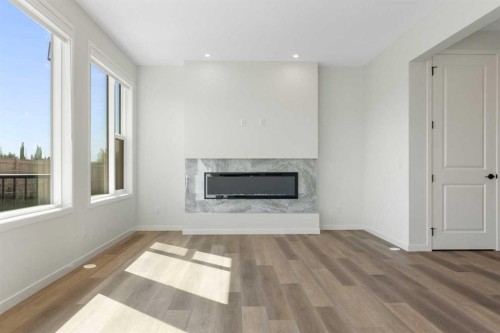 266 West Grove Lane Sw, Calgary, AB - Indoor Photo Showing Living Room With Fireplace