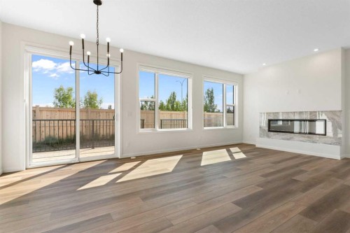 266 West Grove Lane Sw, Calgary, AB - Indoor Photo Showing Living Room With Fireplace