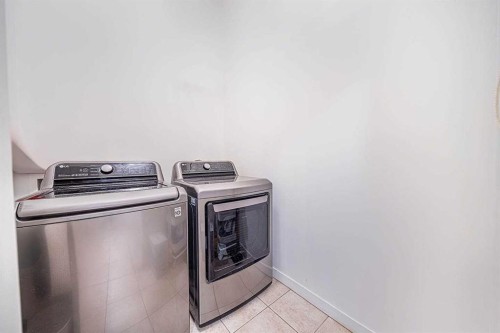 30 Chapalina Park Crescent Se, Calgary, AB - Indoor Photo Showing Laundry Room