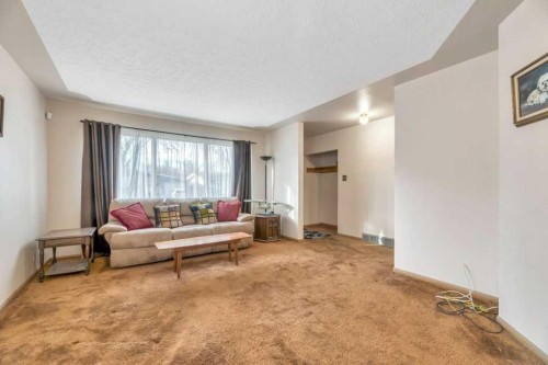 30 Butler Crescent Nw, Calgary, AB - Indoor Photo Showing Living Room