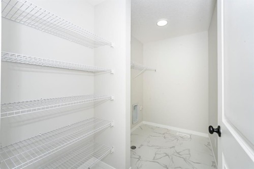 522 Lucas Boulevard Nw, Calgary, AB - Indoor With Storage