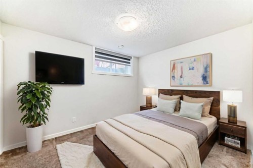 152 Cranbrook Square Se, Calgary, AB - Indoor Photo Showing Bedroom