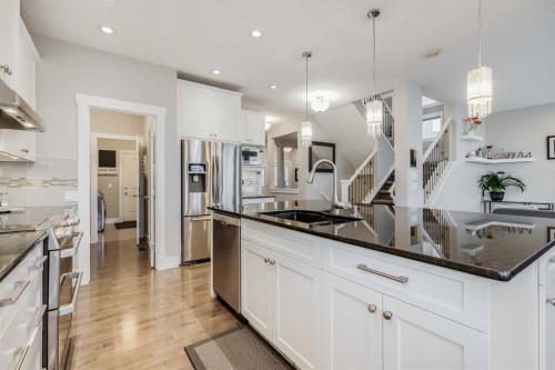 80 Evansfield Place Nw, Calgary, AB - Indoor Photo Showing Kitchen With Stainless Steel Kitchen With Double Sink With Upgraded Kitchen