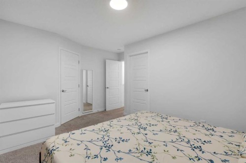 28 Redstone Boulevard Ne, Calgary, AB - Indoor Photo Showing Bedroom