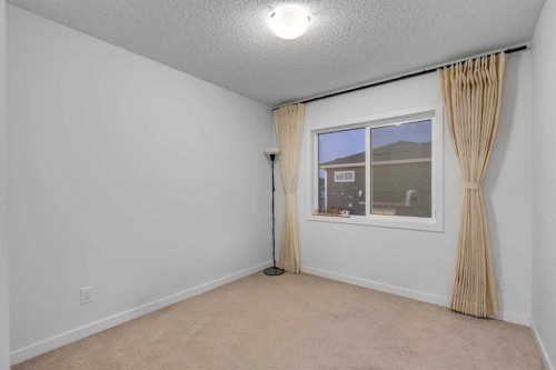 28 Redstone Boulevard Ne, Calgary, AB - Indoor Photo Showing Other Room