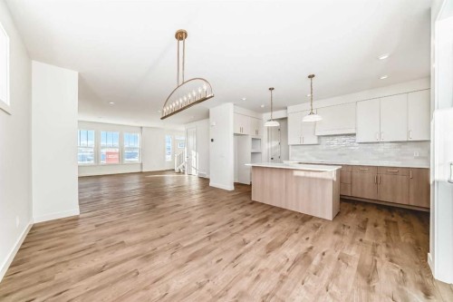 191 Perch Bend, Rural Rocky View County, AB - Indoor Photo Showing Kitchen With Upgraded Kitchen
