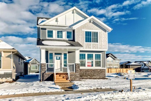 191 Perch Bend, Rural Rocky View County, AB - Outdoor With Facade