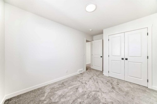 191 Perch Bend, Rural Rocky View County, AB - Indoor Photo Showing Other Room