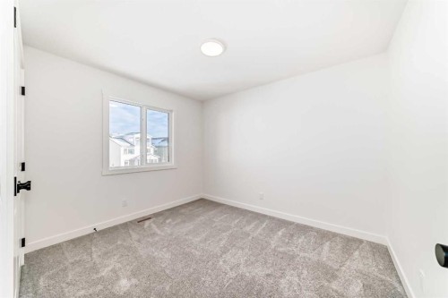 191 Perch Bend, Rural Rocky View County, AB - Indoor Photo Showing Other Room