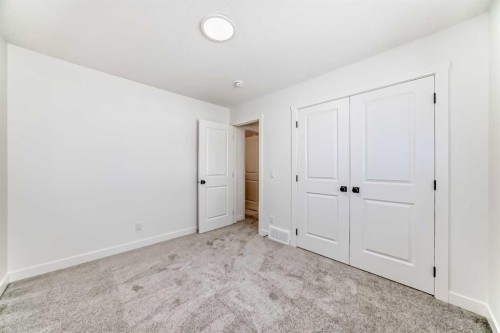 191 Perch Bend, Rural Rocky View County, AB - Indoor Photo Showing Other Room