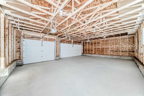 191 Perch Bend, Rural Rocky View County, AB - Indoor Photo Showing Garage