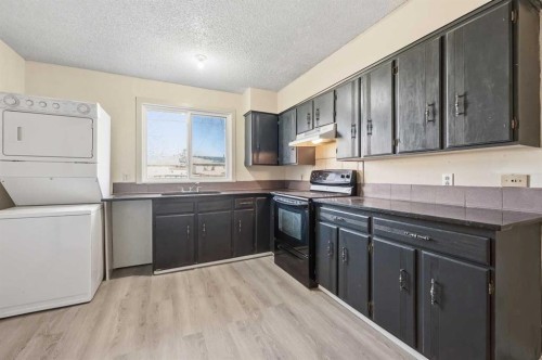 1643 Marlyn Way Ne, Calgary, AB - Indoor Photo Showing Laundry Room