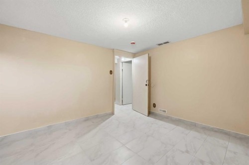 1643 Marlyn Way Ne, Calgary, AB - Indoor Photo Showing Other Room