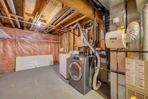 16218 Shawbrooke Road Sw, Calgary, AB - Indoor Photo Showing Laundry Room