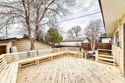 307 Huntridge Road Ne, Calgary, AB - Outdoor With Deck Patio Veranda
